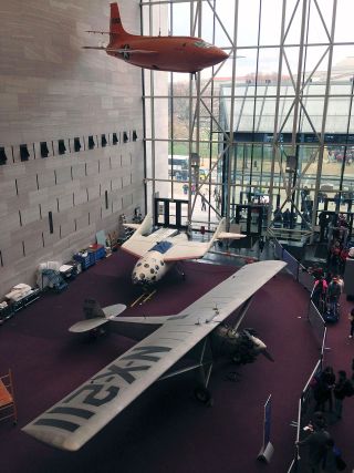 Ten years after being suspended from the ceiling, SpaceShipOne was temporarily lowered to the ground on March 27, 2015, as part of the National Air and Space Museum's redesign of its Milestones of Flight gallery.