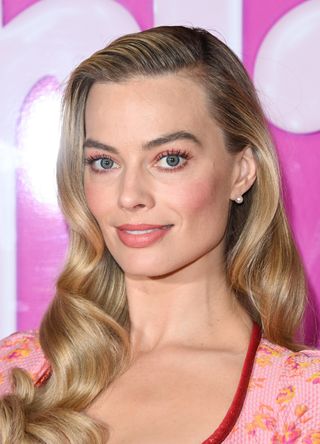 Margot Robbie attends a photocall on July 13, 2023 in London, England