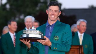Rory McIlroy holding the Masters trophy after winning the tournament in 2025
