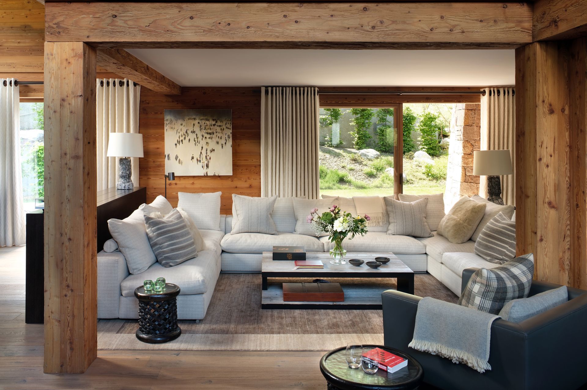 sofas in a living room with garden views