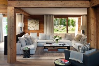 sofas in a living room with garden views