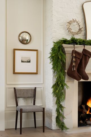 a fireplace with a simple garland