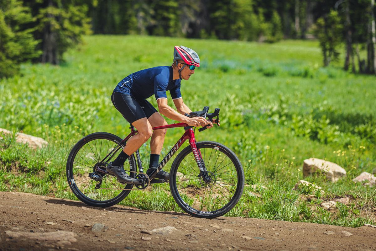 someone riding a Niner gravel bike
