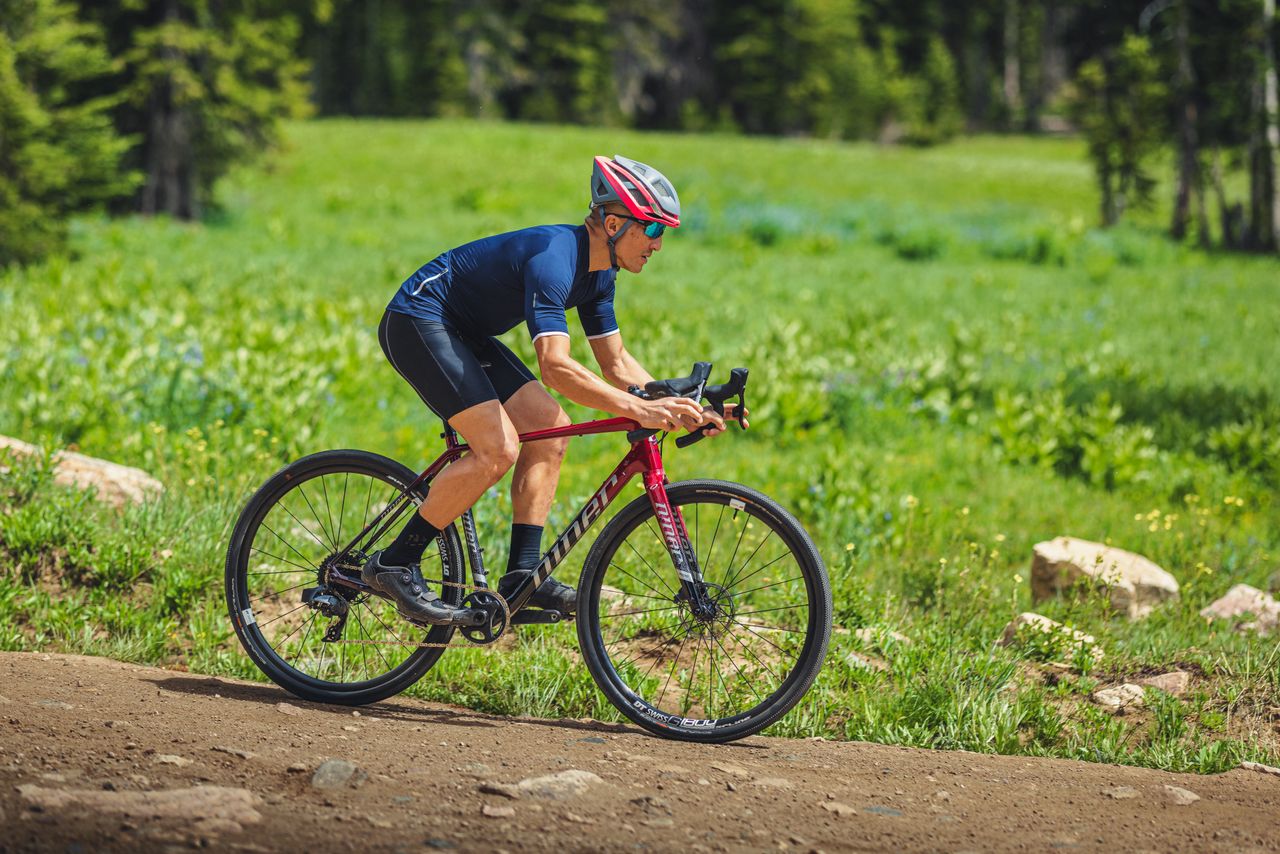 someone riding a Niner gravel bike