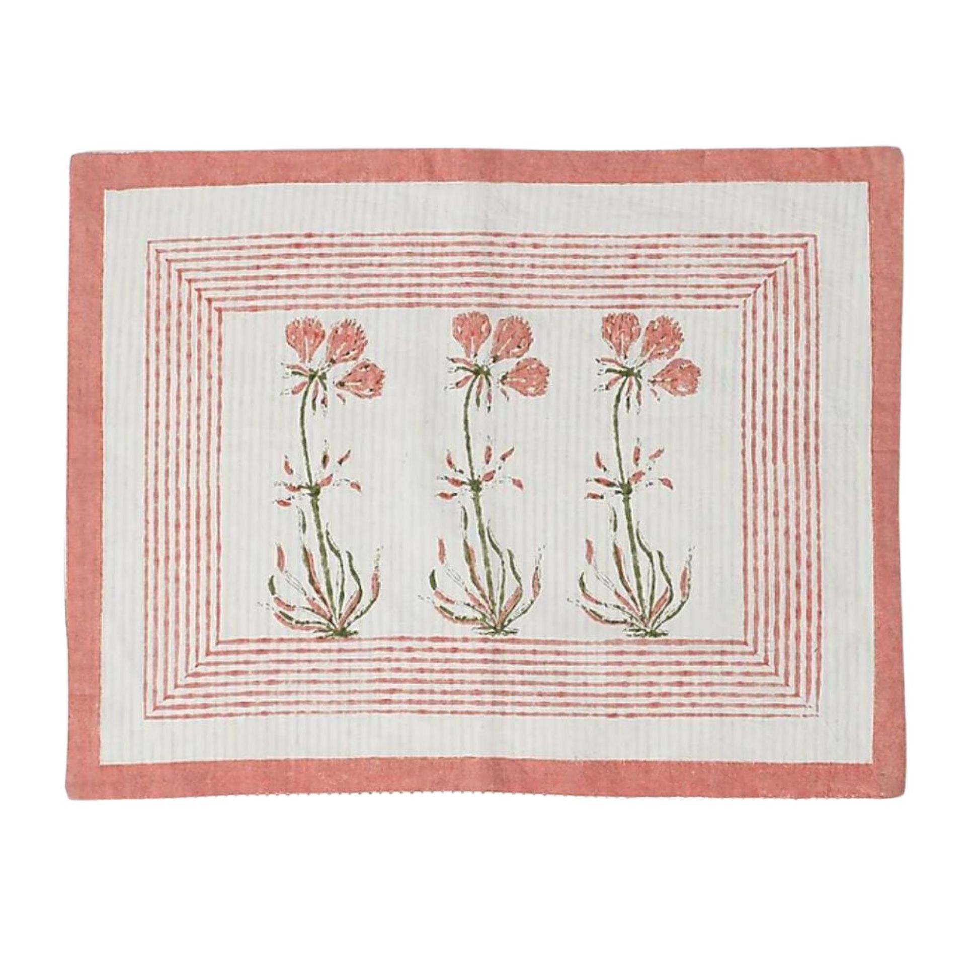 Satu set alas piring motif bunga berwarna merah muda dan netral