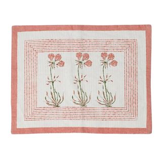 A set of pink and neutral floral block printed placemats