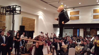Mexican politicians take a whack at a Donald Trump piñata.