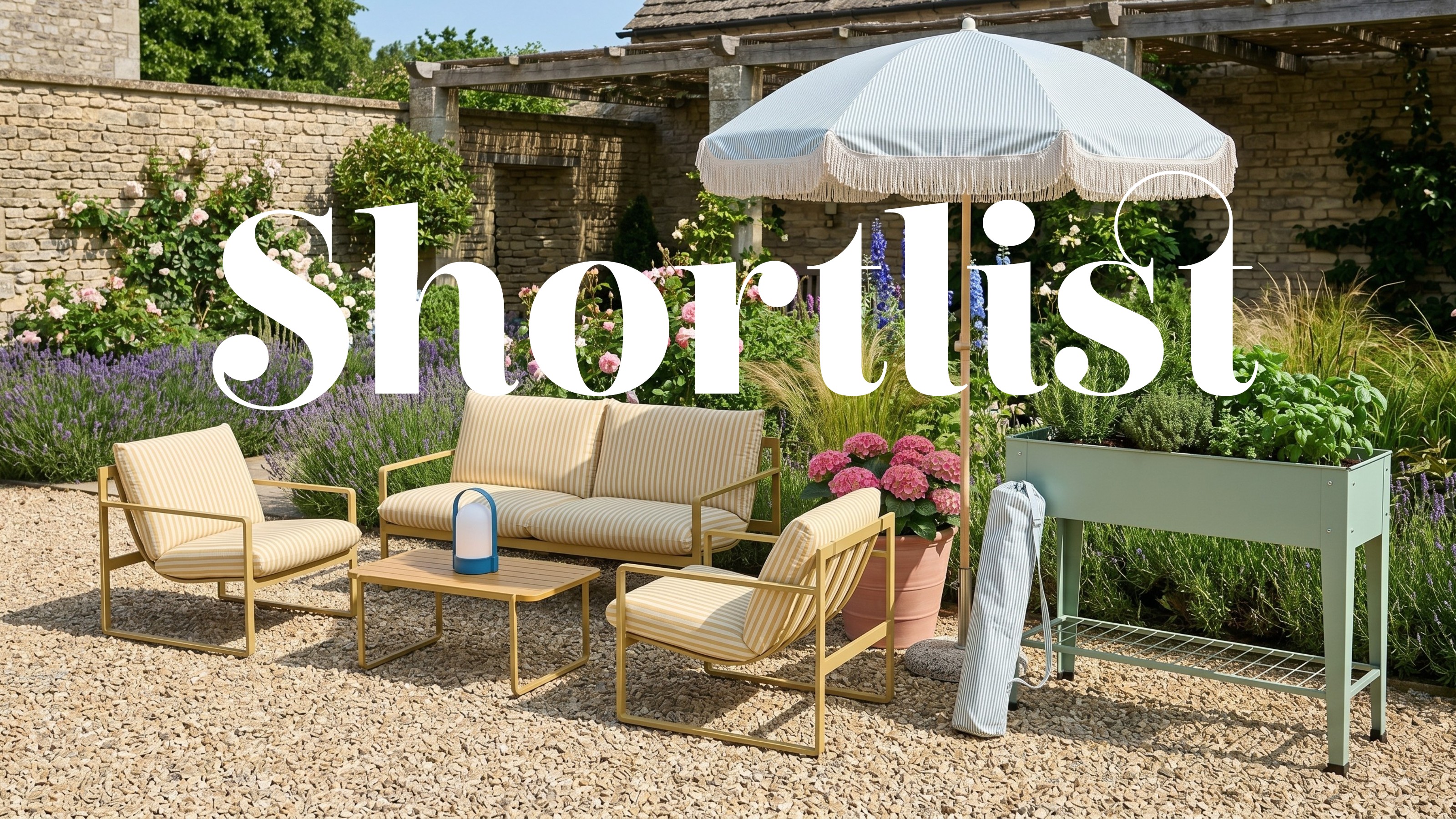 A blooming garden with a yellow striped outdoor lounge set, a green striped parasol with a fringed trim set next to the set