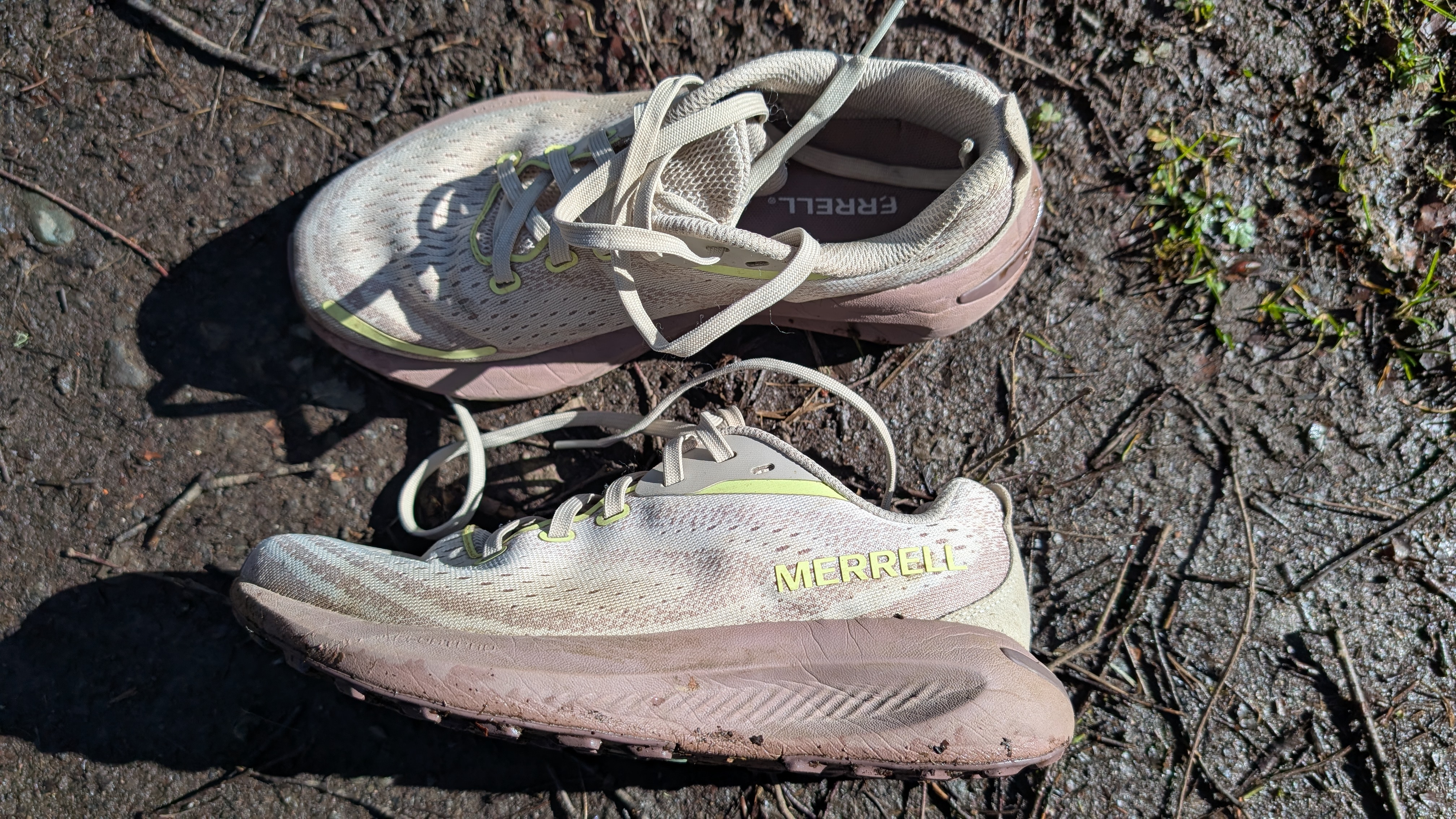 Merrell Morphlite trail running shoes lying next to each other on the trail