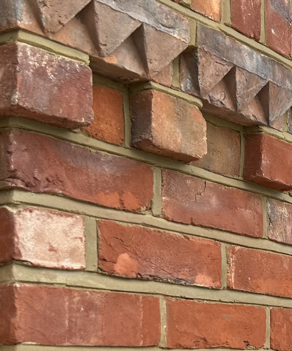 An example of weather struck pointing in a piece of brickwork