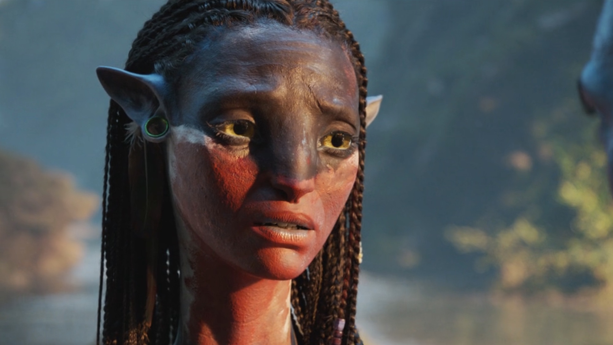 Neytiri in red face paint during Avatar: Fire and Ash. 
