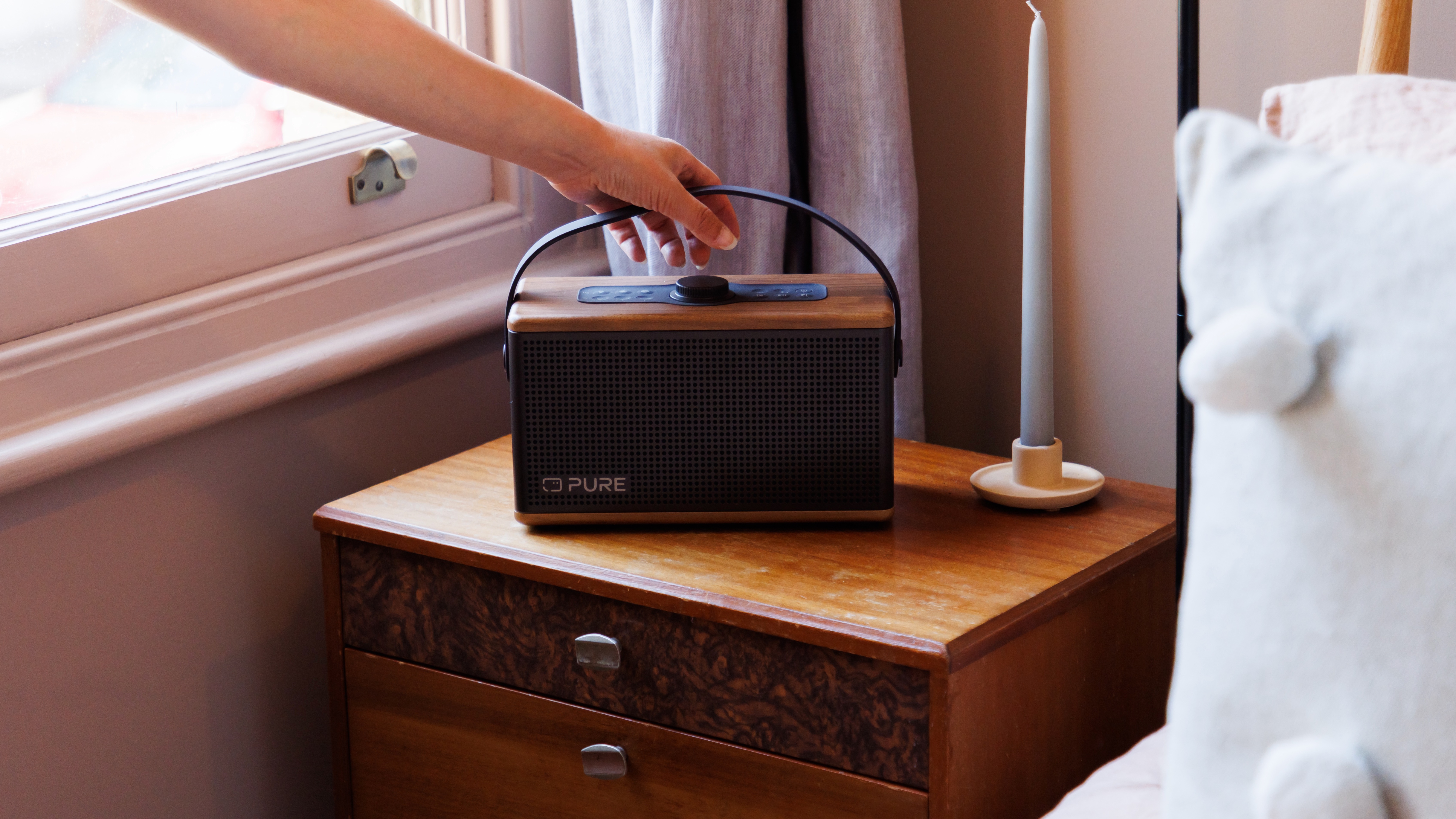 Pure Classic Aura Bluetooth speaker on bedside table