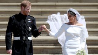 Prince Harry, Duke of Sussex and the Duchess of Sussex depart after their wedding ceremony