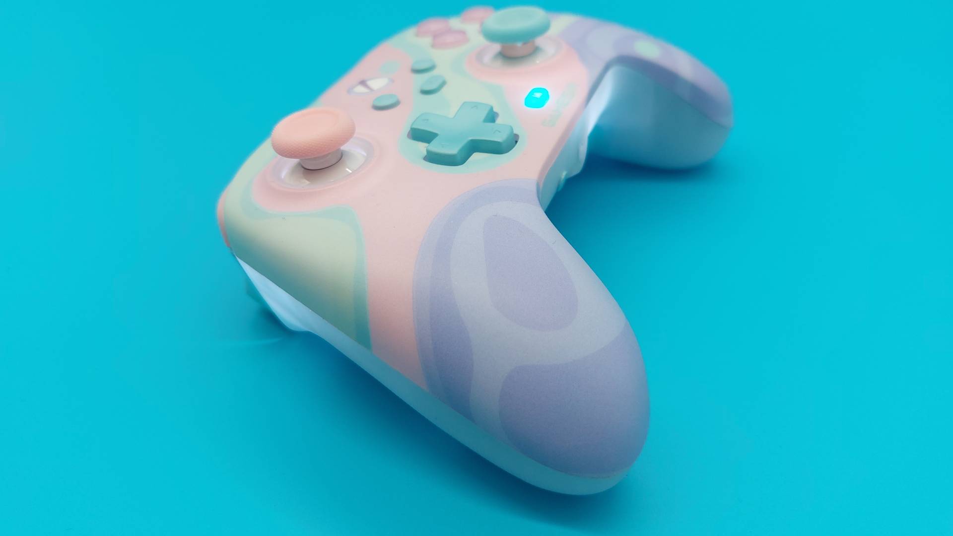 The GameSir T7 Pro Sugar Whirl Wireless Controller seen from various angles.