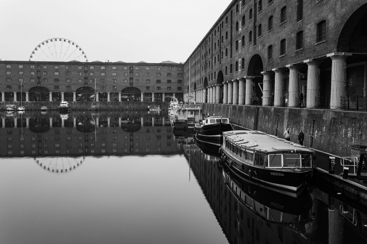 Albert Dock in Liverpool with canal boats moored
