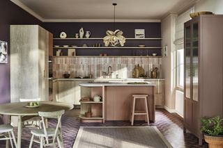 A modern kitchen with a cooks' kitchen island