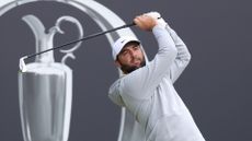 Scottie Scheffler teeing off on the first hole of The 153rd Open Championship at Royal Portrush Golf Club on July 18, 2025 in Portrush, Northern Ireland