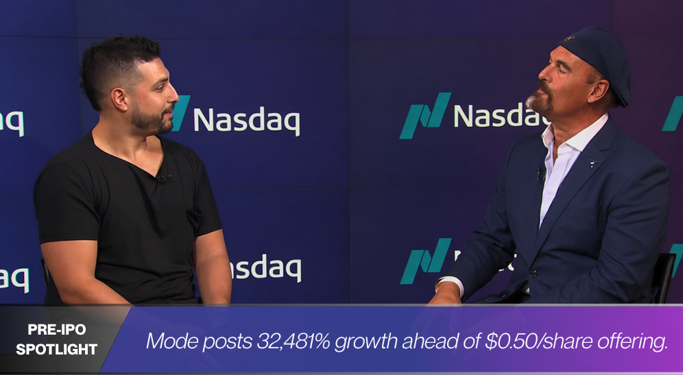 Two men discussing investment with a Nasdaq background