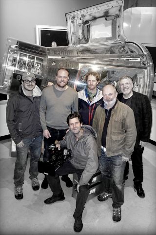 "Armstrong" filmmakers with Neil Armstrong's Gemini 8 spacecraft at the Armstrong Air & Space Museum in Ohio.