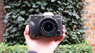 A charcoal Fujifilm X-T30 III mirrorless camera