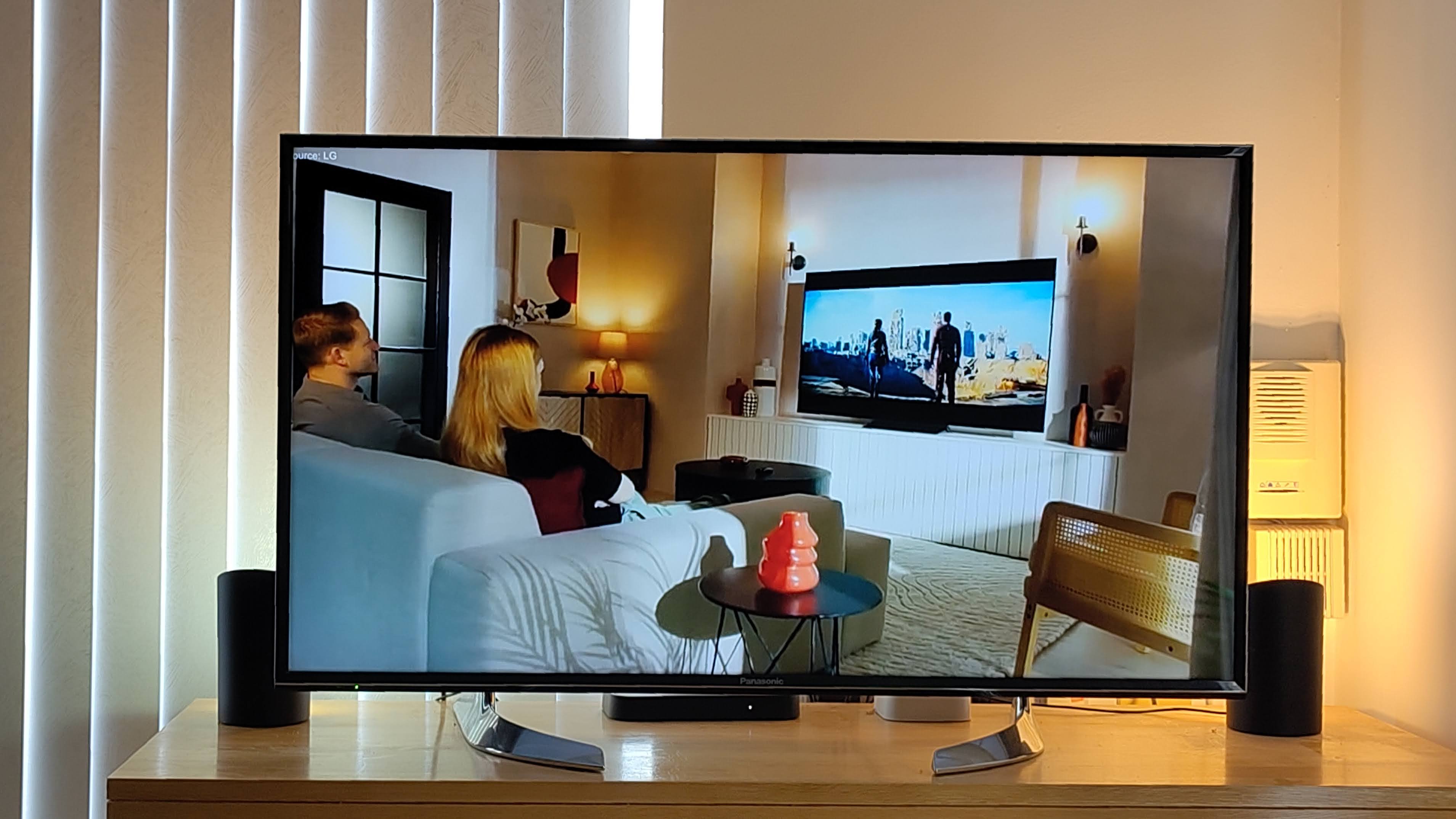 Two Philips Hue Play Wall Washer lights beside TV