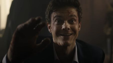 Nathan Caine (Jack Quaid) tries to catch a knife in Novocaine