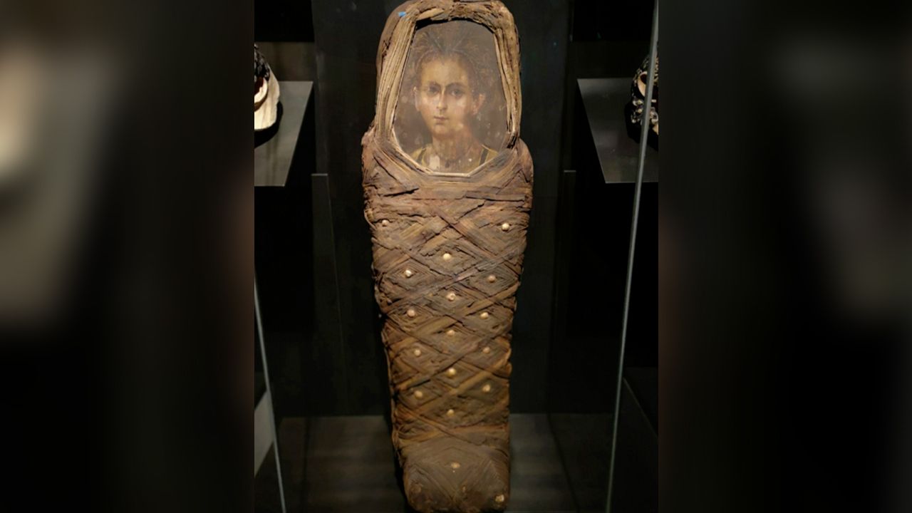 The mummy of the young boy, who lived sometimes between 50 B.C. and A.D. 100 .