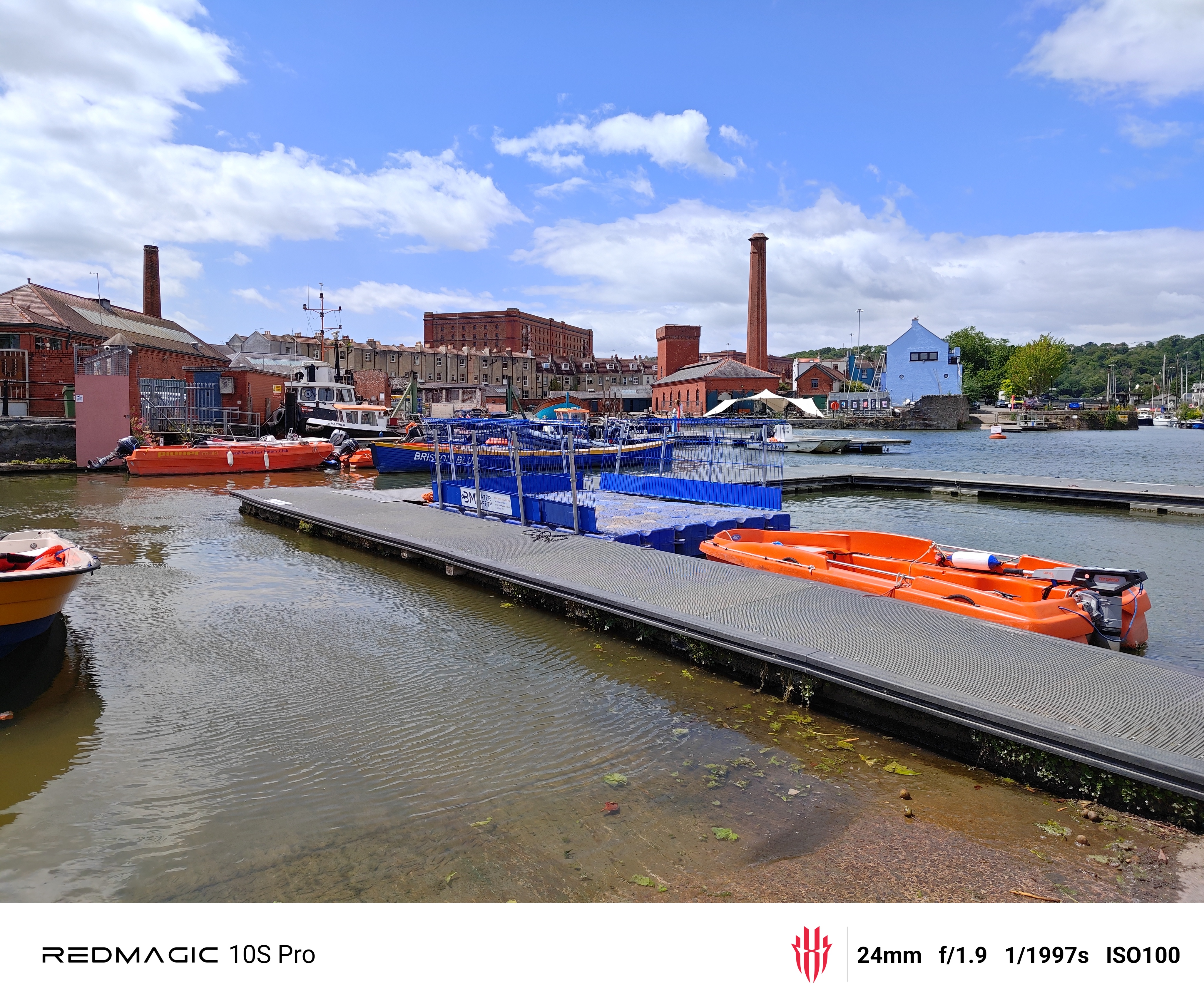 Image of a harbourside with orange and blue boats shot on RedMagic 10S Pro gaming phone