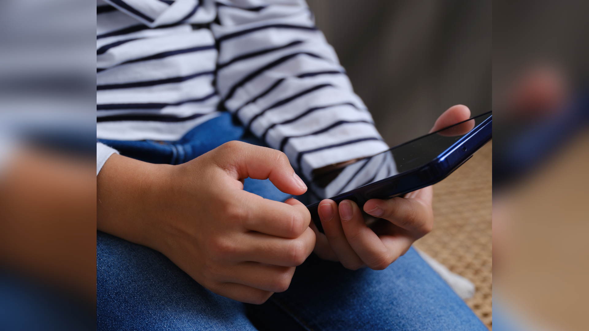 The HMD Fuse smartphone in the hands of a small child