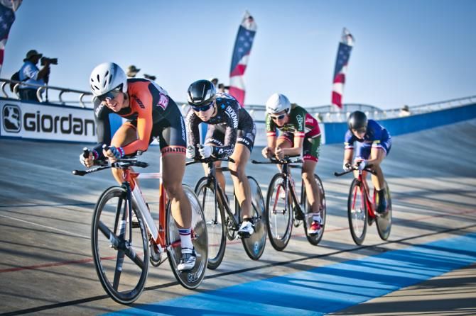 Elizabeth Newell, Tela Crane, Jessica Prinner and Kimberly Geist set a new track record for the Women's Team Pursuit, and win the Gold