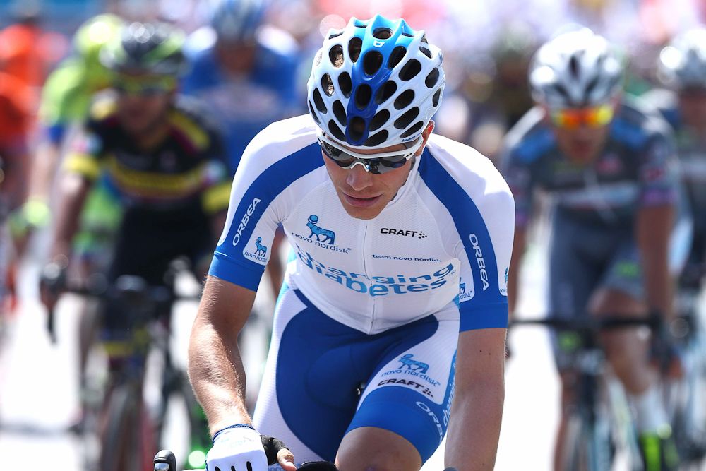 A Novo Nordisk riders crosses the line.