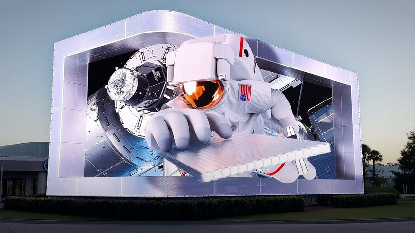 Astronaut bursting from 3D billboard