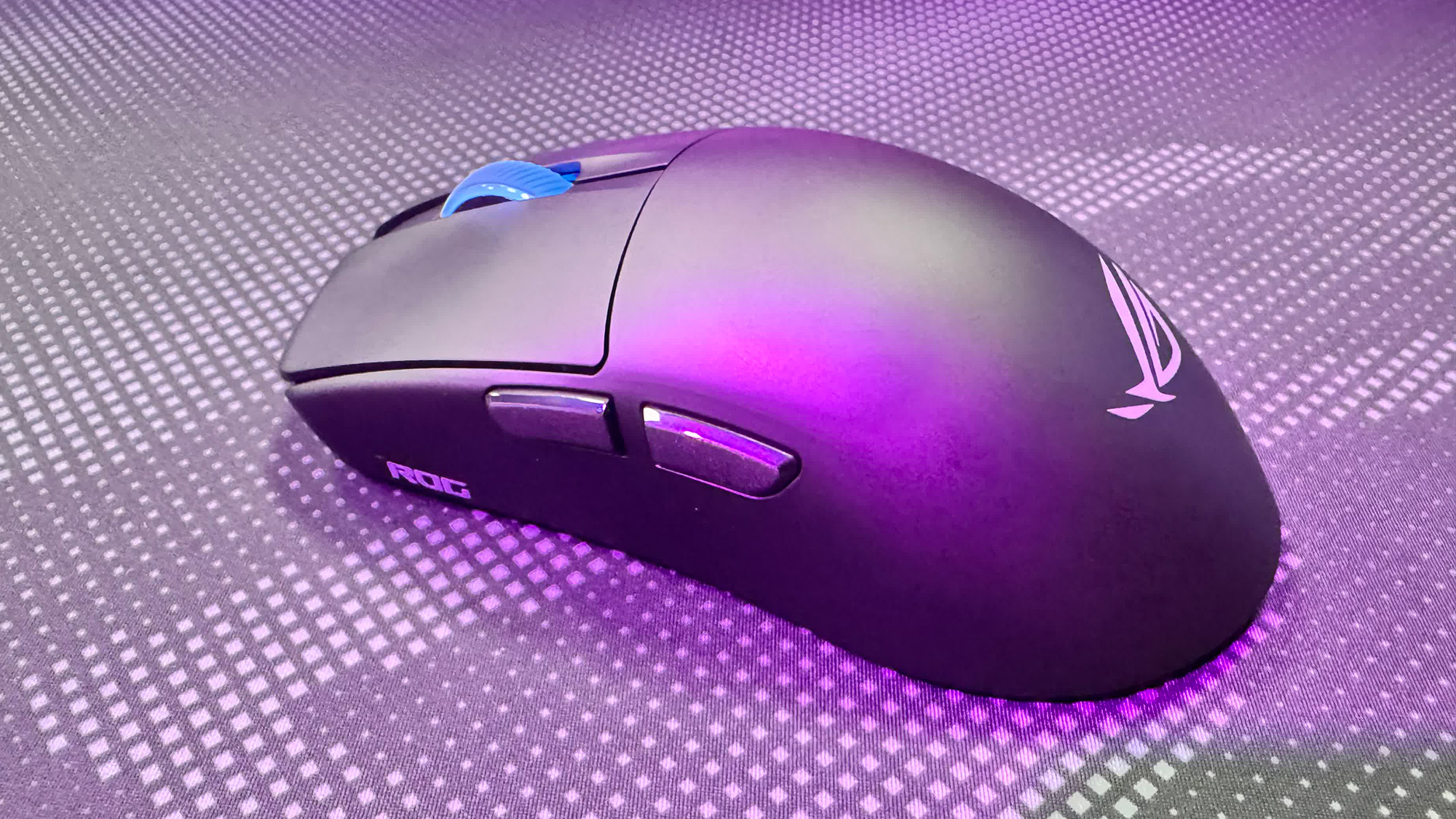 Asus ROG Harpe II Ace gaming mouse on a mousepad at Computex 2025.