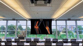 The Glassroom is a 1,325-square-foot classroom with three glass walls and configurable seating for up to 67 students.