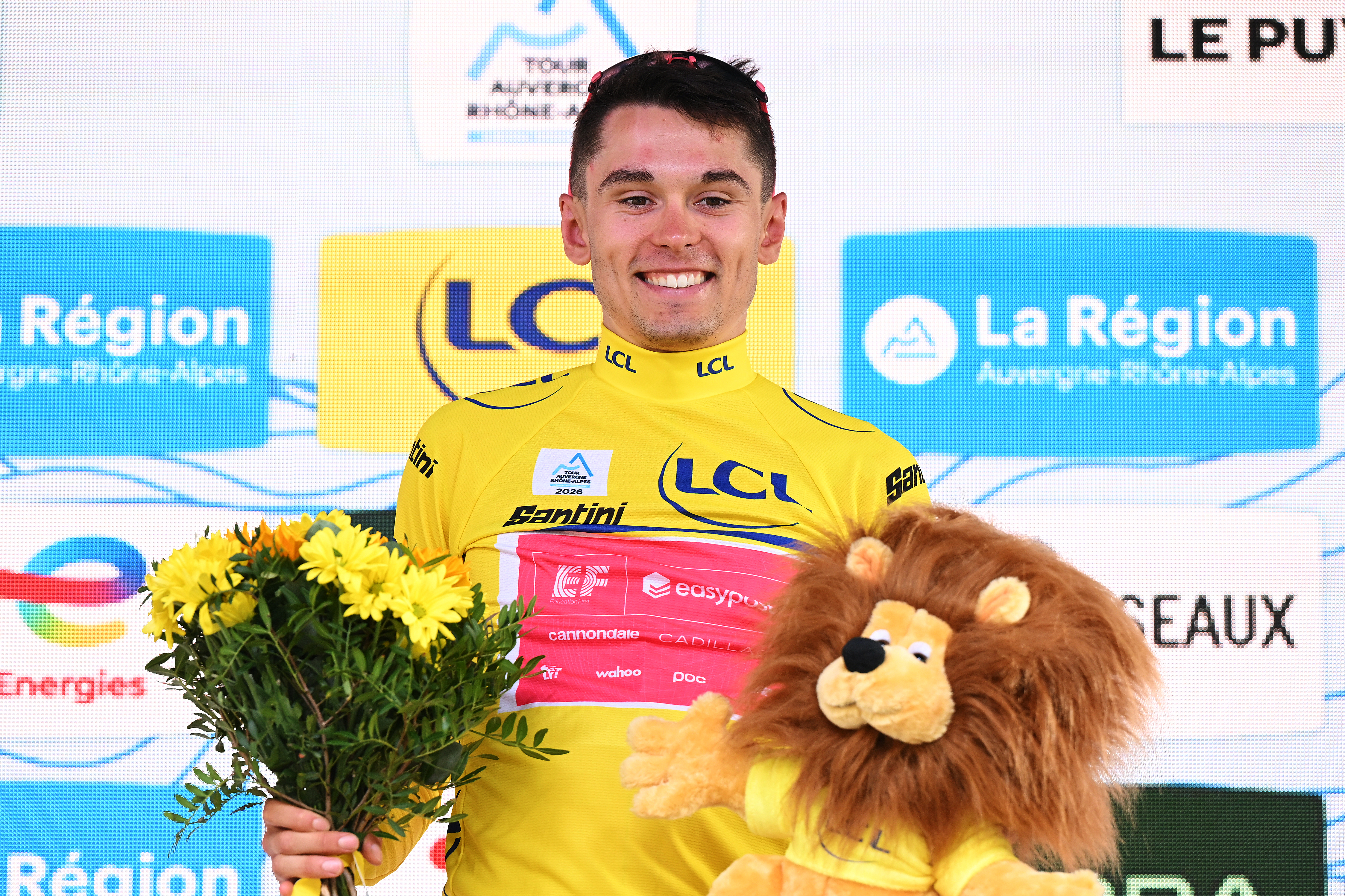 LE PUY-EN-VELAY, FRANCE - JUNE 08: Alex Baudin of France and Team EF Education - EasyPost celebrates at podium as Yellow Leader Jersey winner during the 78th Tour Auvergne-Rhone-Alpes 2026, Stage 2 a 234.3km stage from Saint-Martin-le-Vinoux to Le Puy-en-Velay 624m / #UCIWT / on June 08, 2026 in Le Puy-en-Velay, France. (Photo by Dario Belingheri/Getty Images)