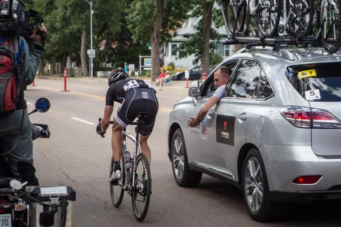 Kim Andersen gives Jens Voigt encouragement on his solo breakaway on stage 4 of the USA Pro Challenge in Colorado Springs