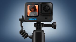 The GoPro Volta grip and a Hero 10 Black on a blue background
