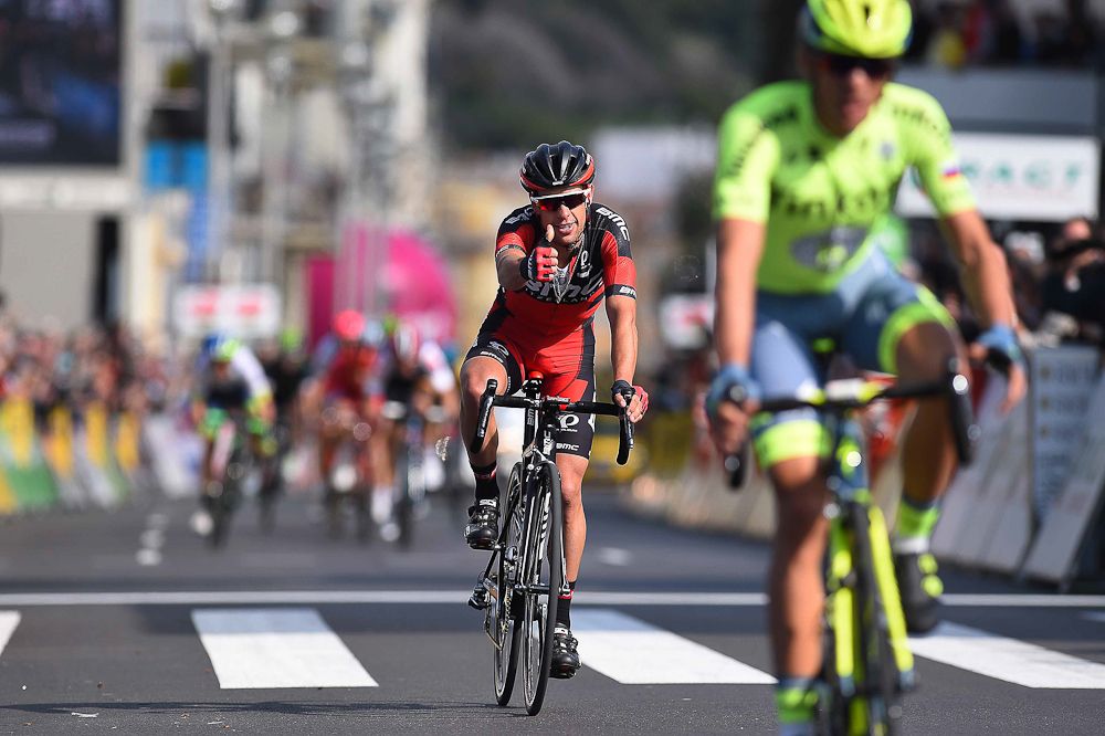 Richie Porte arrives at the finish of Paris-Nice behind Alberto Contador