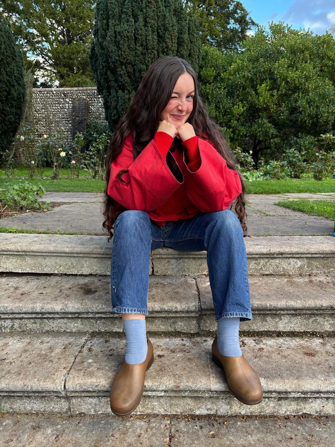 Influencer Daisy Murrat wearing gardening shoes.