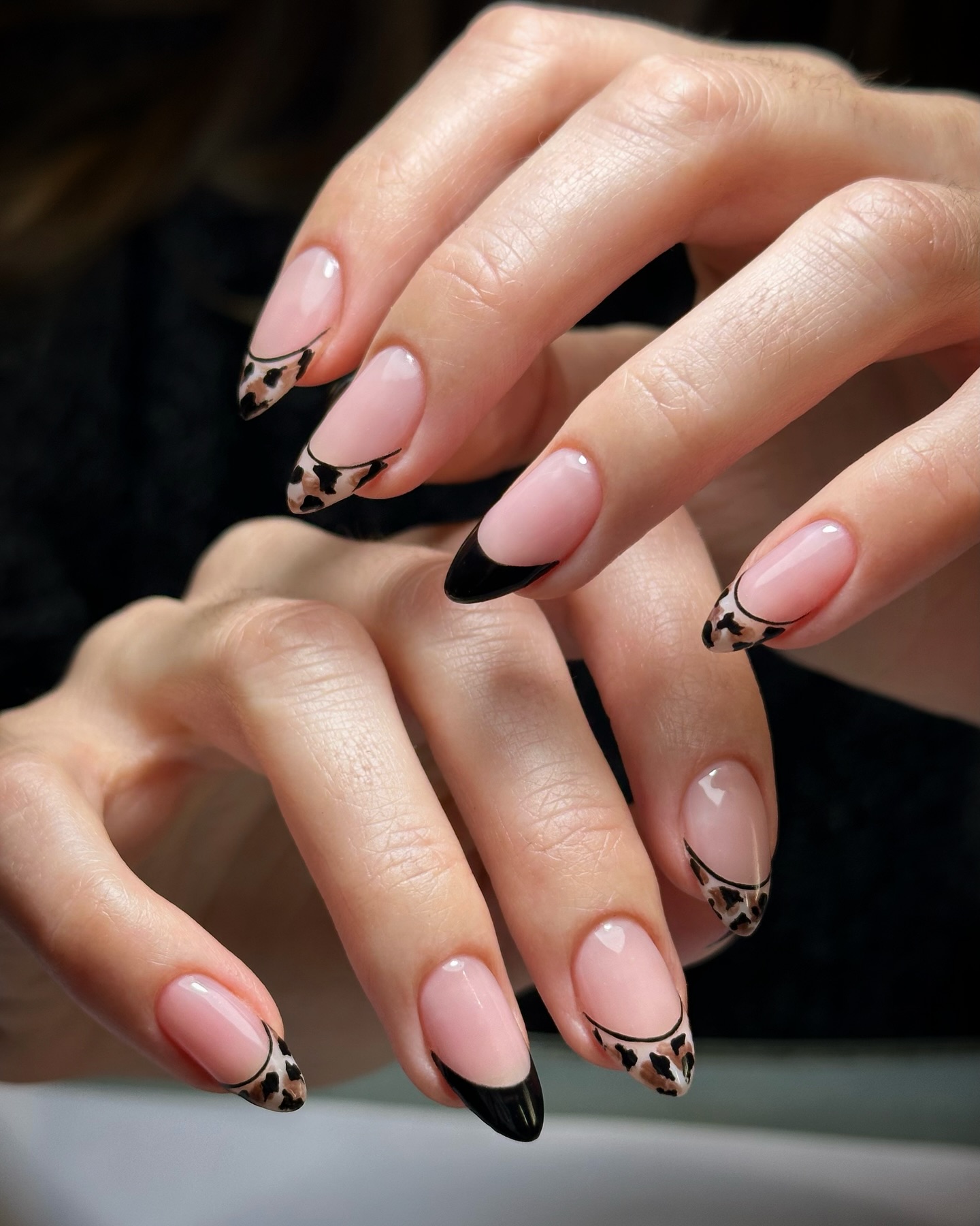 Black nail polish manicure design.