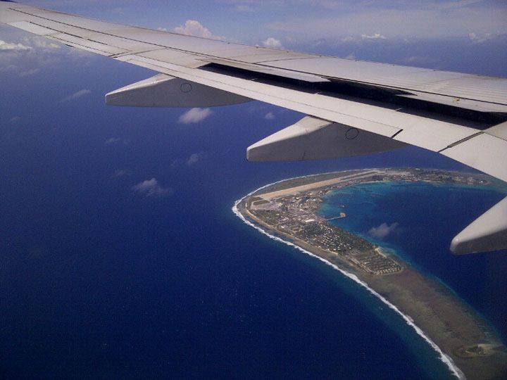 Orbital Science Corp.&#039;s L-1011 aircraft &quot;Stargazer&quot; flies over the runway on Kwajalein Atoll, which is home to the island of Roi-Namur.