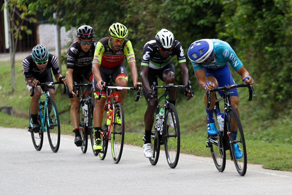 Travis McCabe checking his rivals during the aggressive start