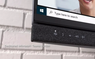 A close up of the Microsoft Teams button on Dell's new Video Conferencing Monitor