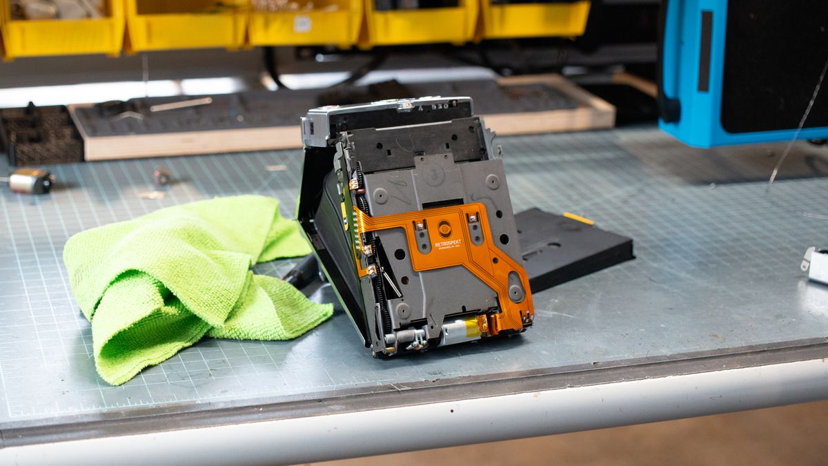 Tear down of the Polaroid SX-70 camera in the Retrospekt workshop during a refurbish