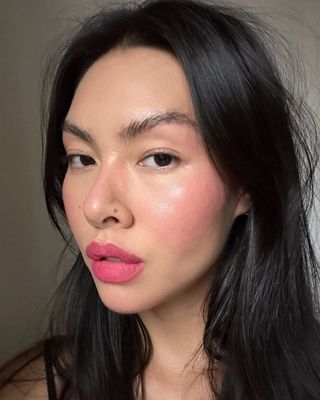 Mimi Nguyen wearing dewy face makeup.