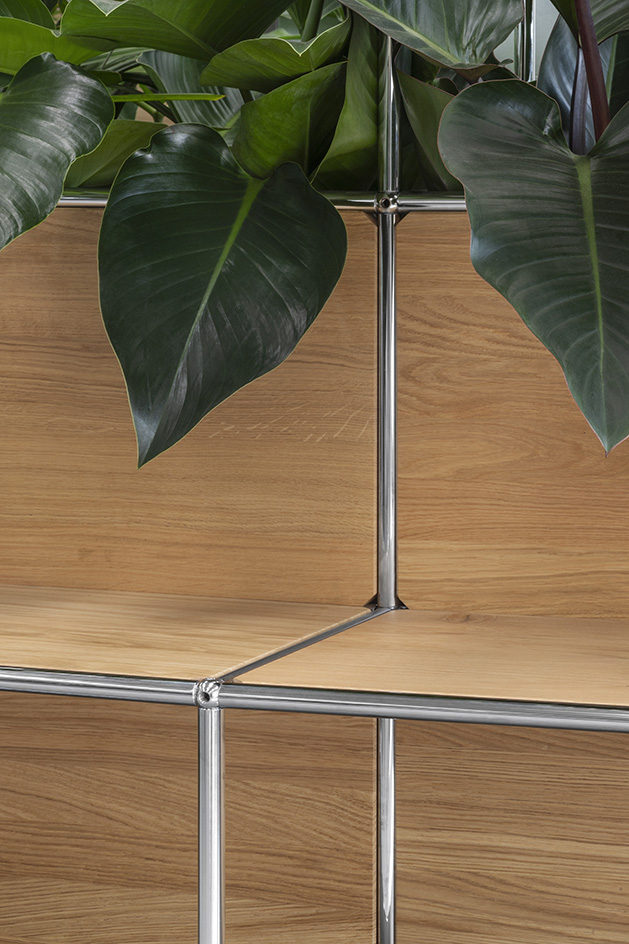 Palazzo Mondadori, modernist space originally designed by Oscar Niemeyer and seen here is the interior renovation by Carlo Ratti using recycled usm shelving