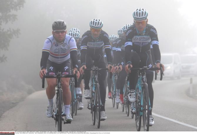 Omega Pharma-QuickStep riders roll through a bit of fog during a training ride