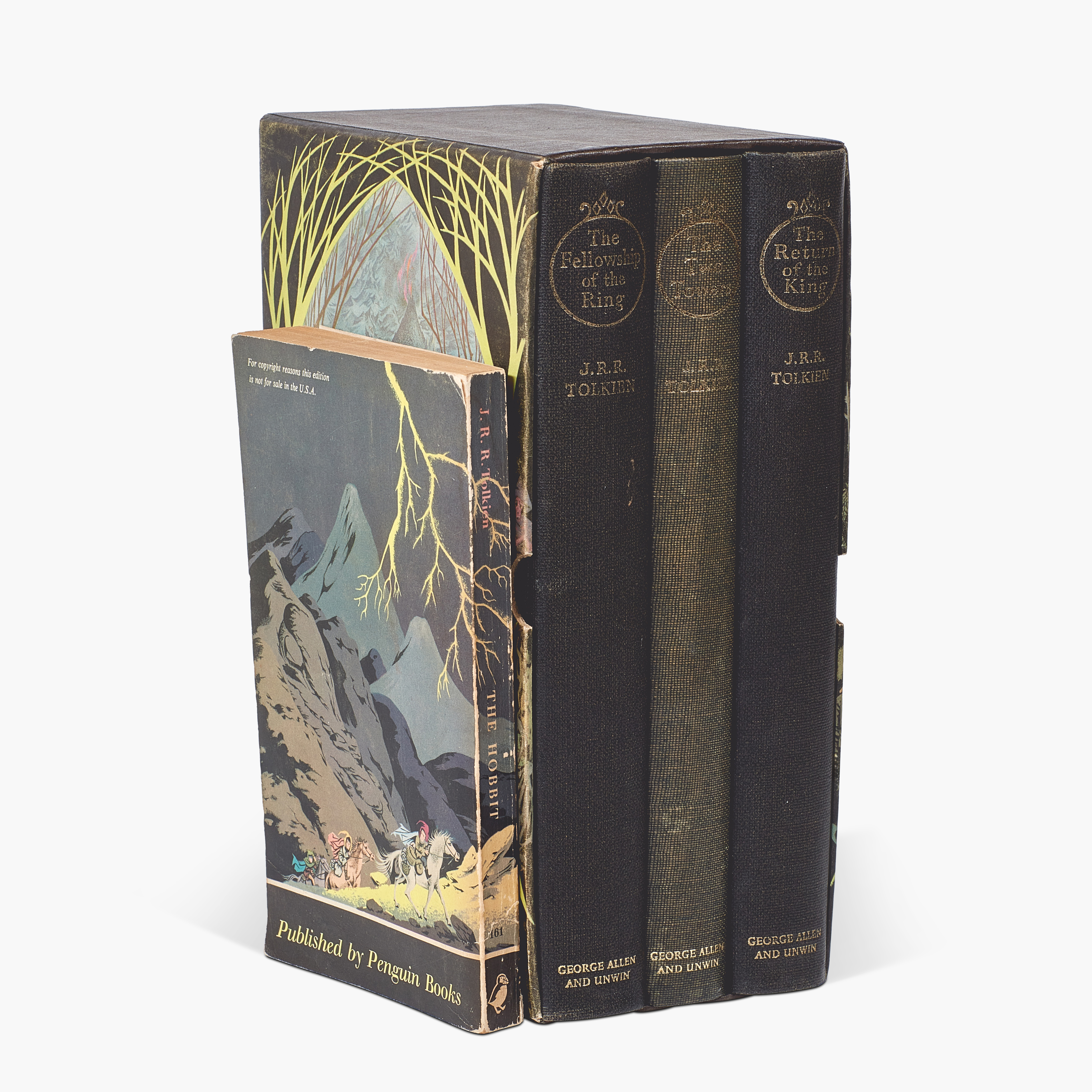 Lot 84. J.R.R. Tolkien The Hobbit, 1961, first paperback issue, signed, with The Lord of the Rings trilogy, 1963, deluxe edition (later impressions), signed, est. &amp;pound;8,000 - 12,000
