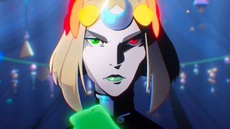 A screencap of the Hades 2 console release trailer. Main character Melinoe glares toward the viewer with her green and red eyes.