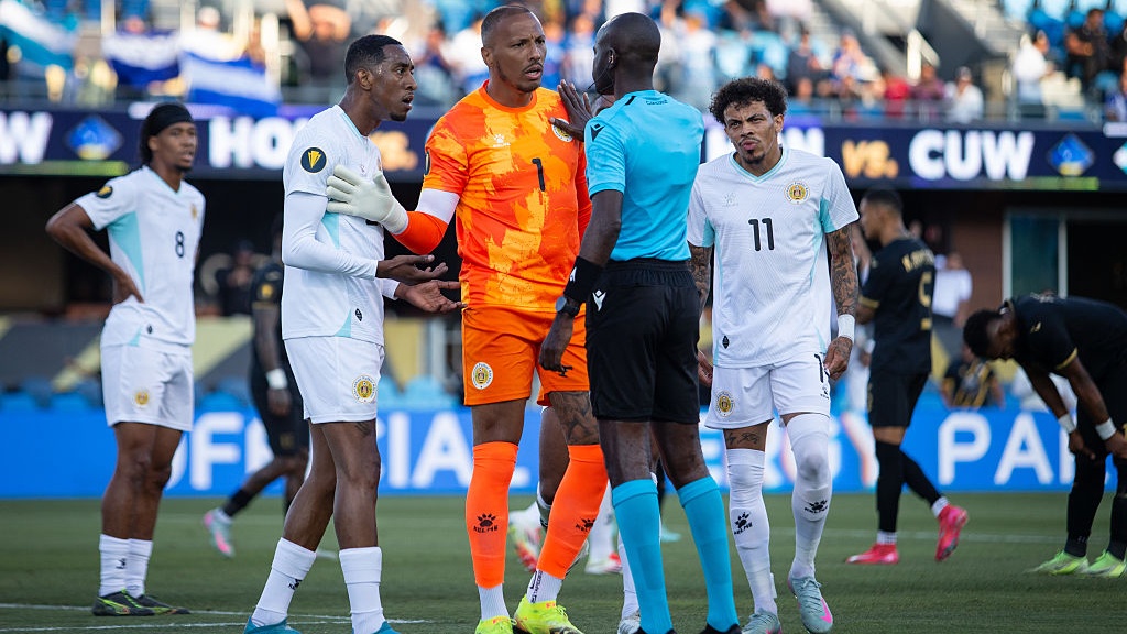 Eloy Room #1, Joshua Brenet #20, and Jeremy Antonisse #11 of Curaao react to a call by Referee Oshane Nation of Jamaica during a 2025 CONCACAF Gold Cup Group B match between Honduras and Curaao at PayPal Park on June 24, 2025 in San Jose, California. 